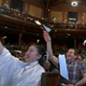Audience members throwing paper airplanes at the 29th annual Ig Nobel awards at Harvard University on September 12, 2019.